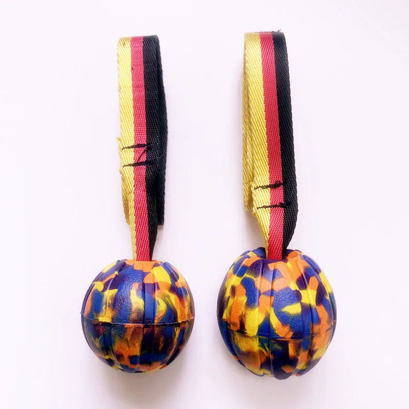 Floating camouflage and yellow EVA foam pet training balls with strings in three different sizes