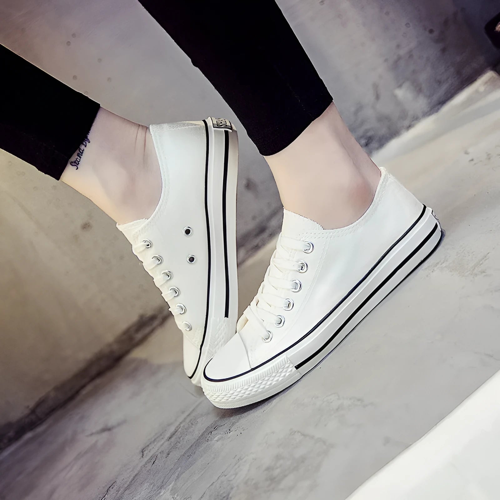 Women's canvas casual shoes in solid colours showing black, white black, white red, and all black options