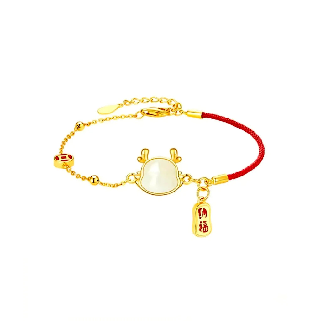 Silver plated dragon zodiac bracelet with Hetian jade detailing on wrist