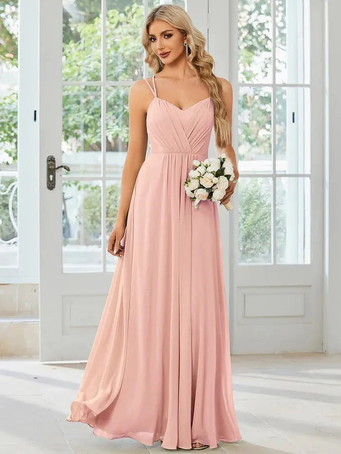 Women's sleeveless A-line long dress with pleated skirt detail in solid colour
