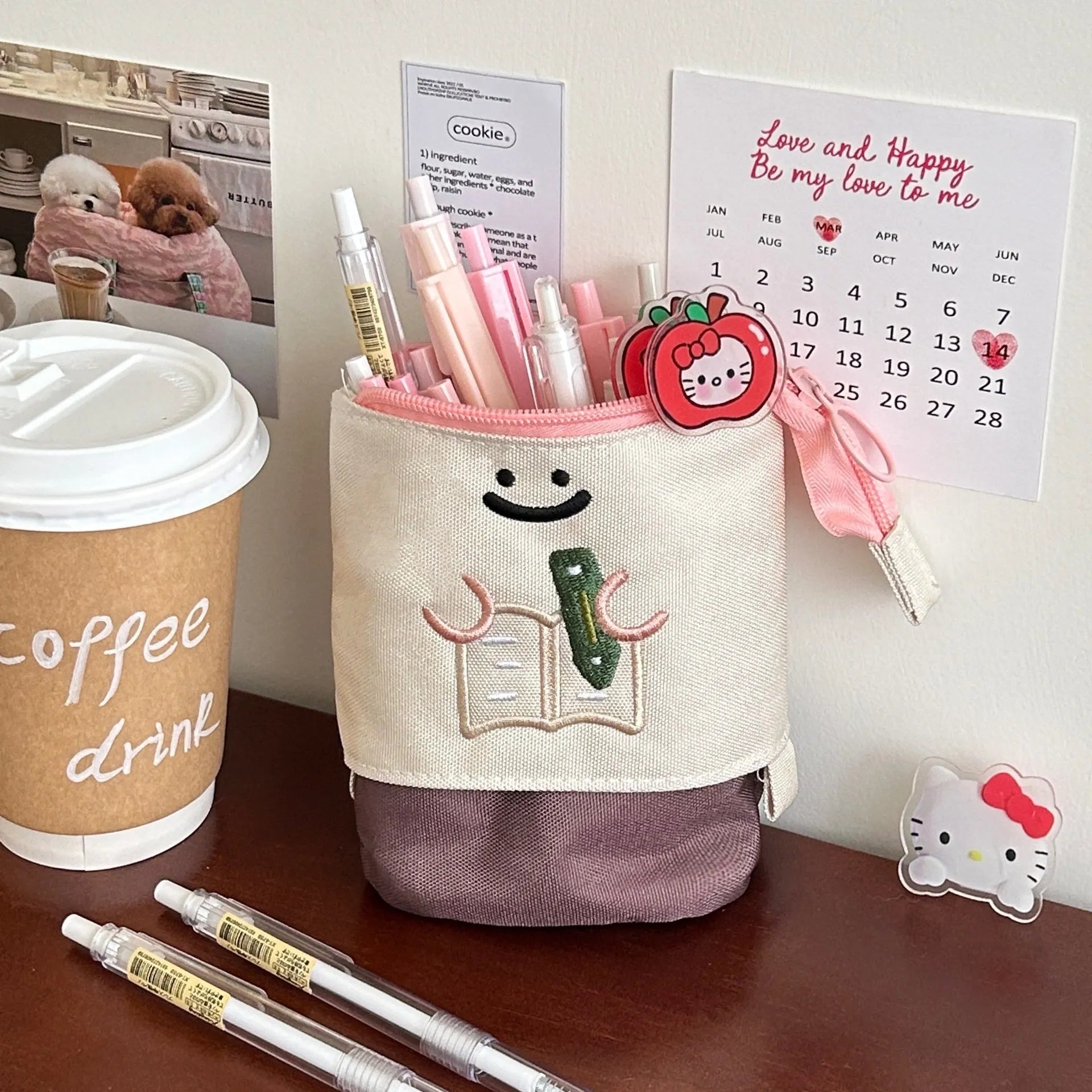 Brown collapsible cartoon design pencil case made from Oxford fabric, shown with zip open.