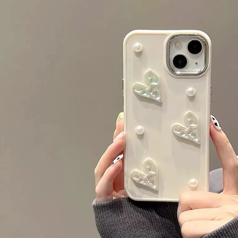 Milky white TPU phone case with pleated heart pattern and small pearl embellishments for iPhone