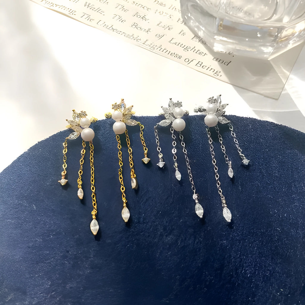 Pearl tassel ear clips in yellow gold or white gold colour with brass base and geometric shape