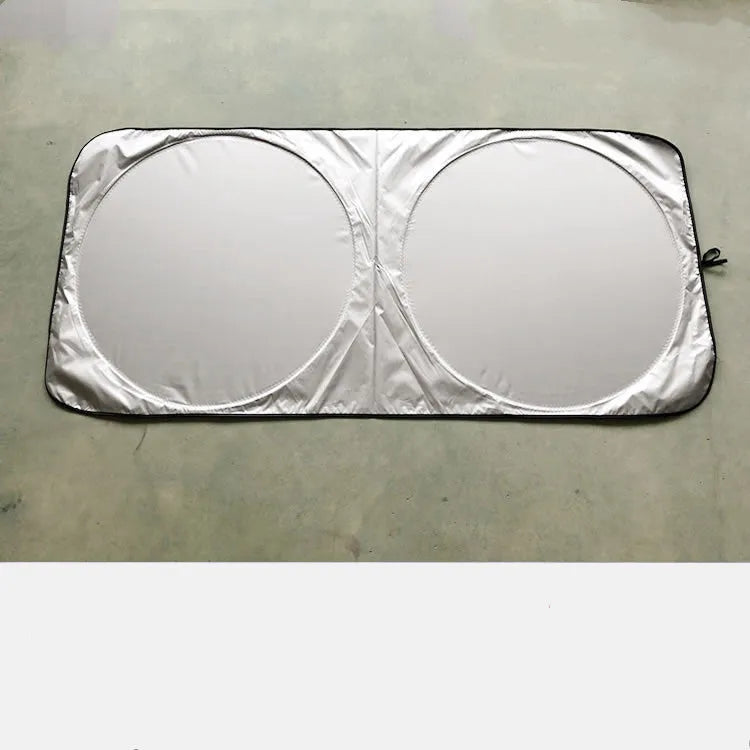 Silver tape car sunshade folded beside 190*90 cloth storage bag showing 190x90cm dimensions