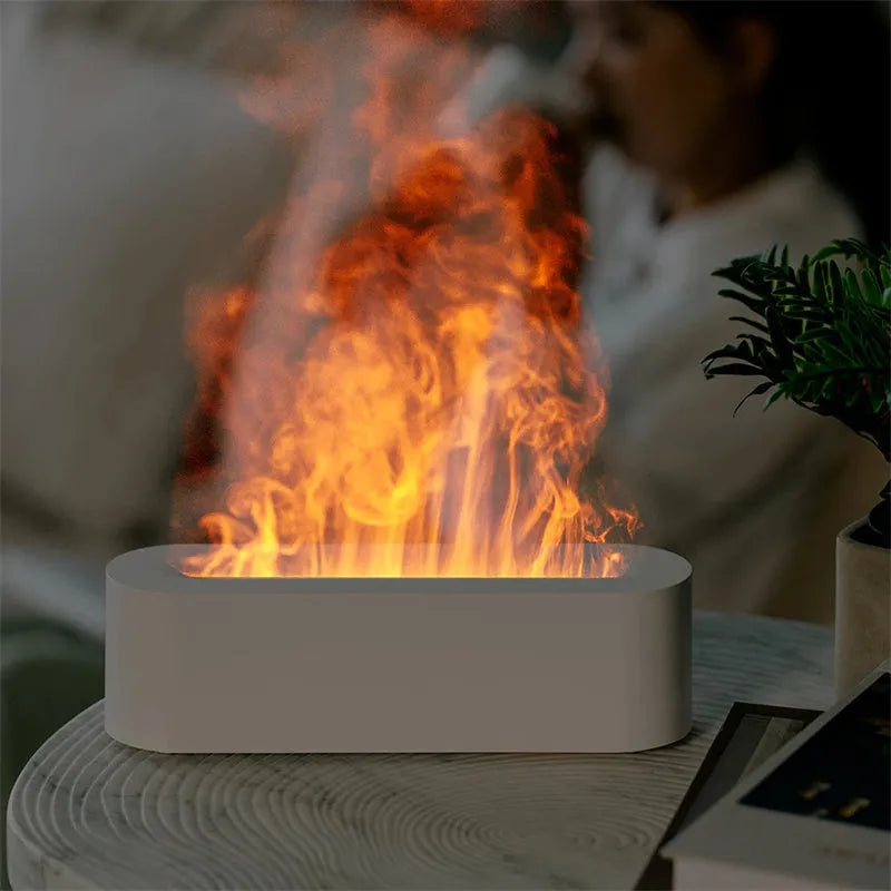 White square DQ709 ultrasonic aroma diffuser with LED flame light effect and cool mist vapour.