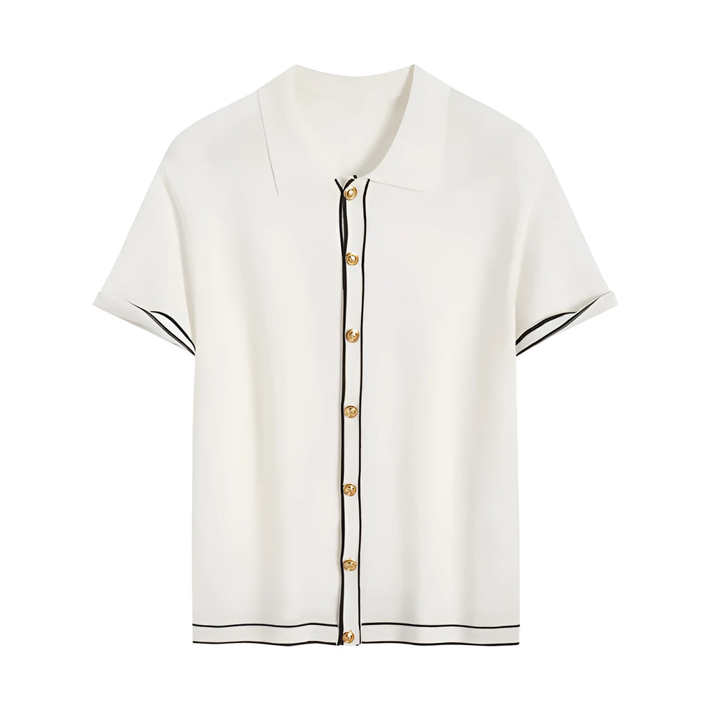 White short-sleeve women's V-neck cardigan with dark contrasting lapels laid flat.