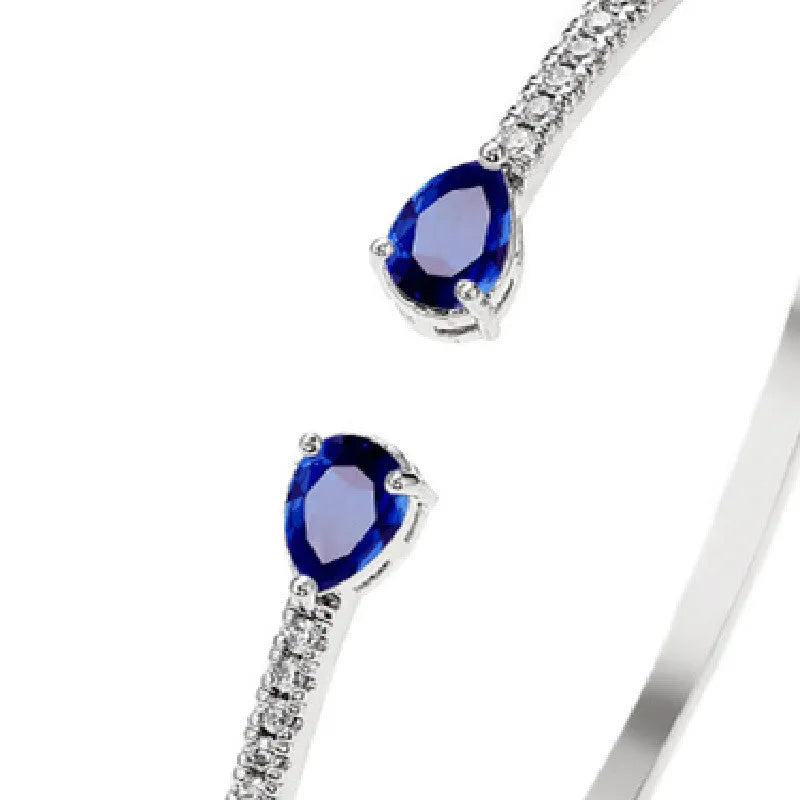 Copper multi-zircon bracelet with simple style in white colour option showing inlaid zircon treatment