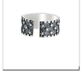 Adjustable silver ring with geometric five-pointed star pattern