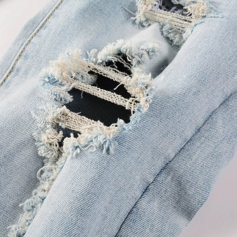 Light blue slim fit stretch jeans for men with hot diamond patch and cat-whisker details