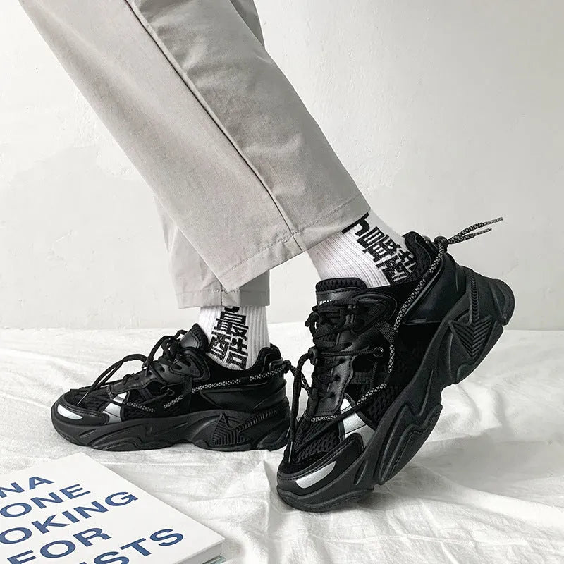 Men's white Korean-style platform dad shoes with thick sole and lace-up front on a plain background