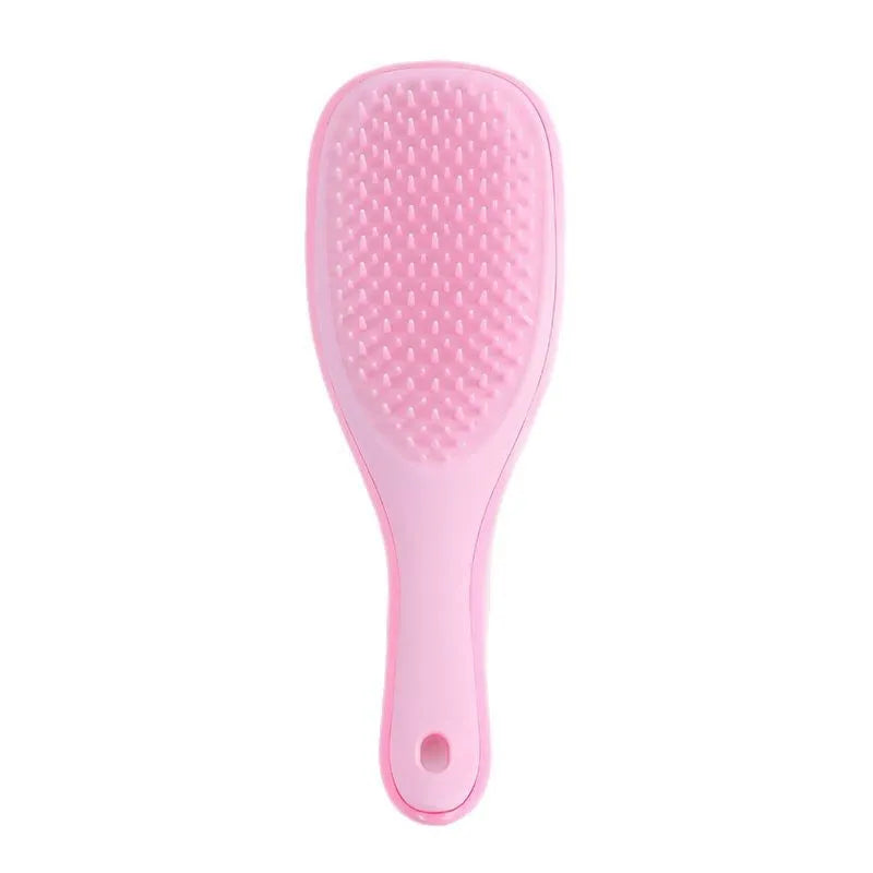 TT Air Curling Massage Home Princess Comb in pink, a plastic air-cushion hairbrush with massage tips