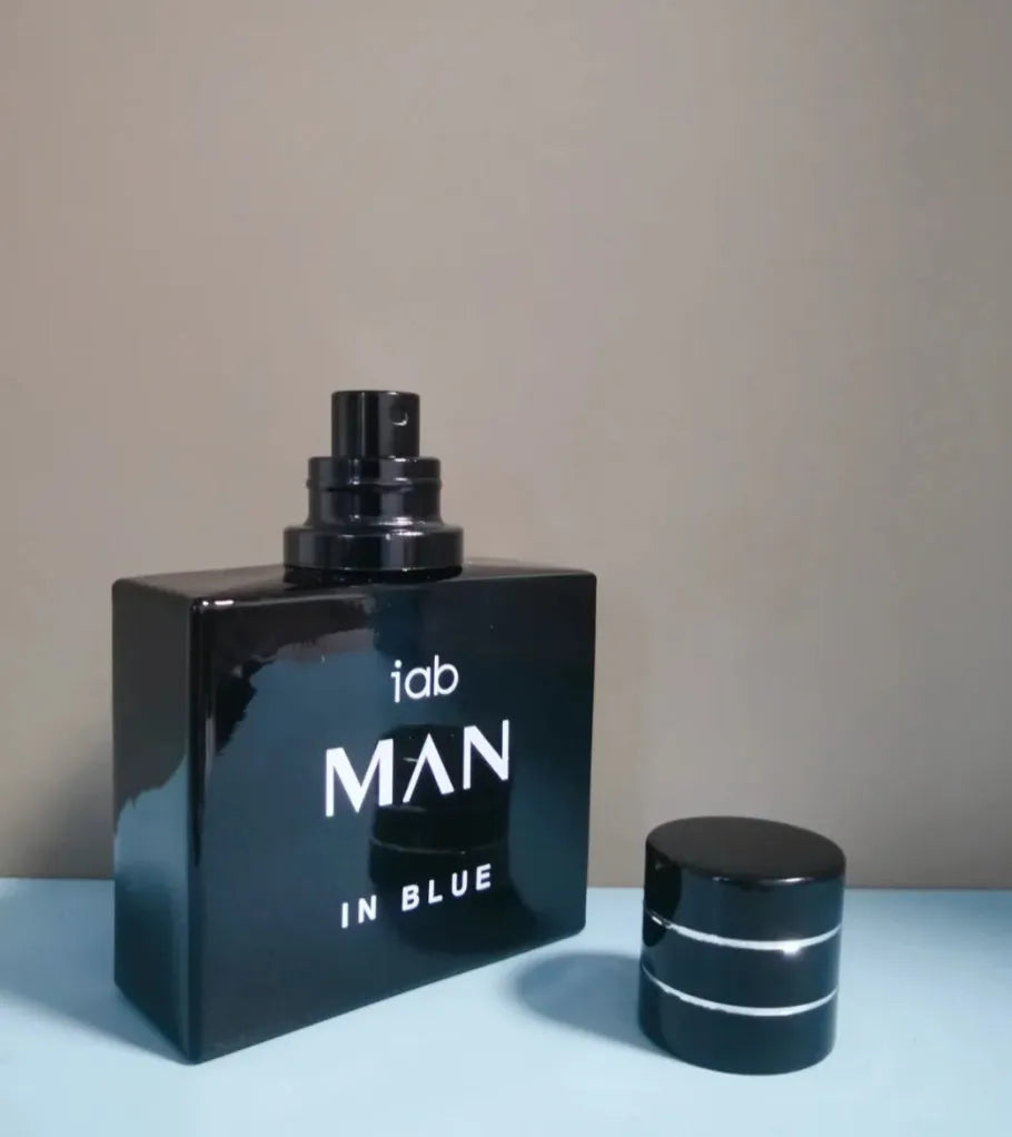 50ml glass bottle of men's citrus perfume with spray applicator