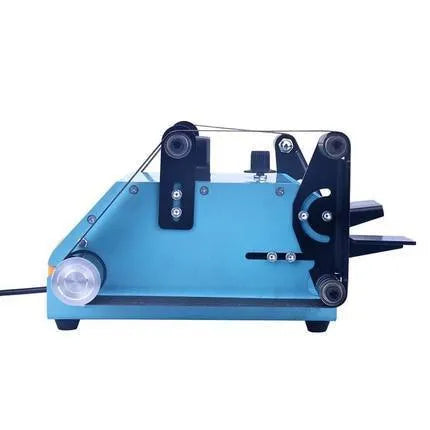 Blue desktop dual-axis belt sander with abrasive belt, variable speed switch, and compact chassis.