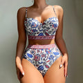 Blue women's high-waisted push-up bikini swimsuit with sleeveless design