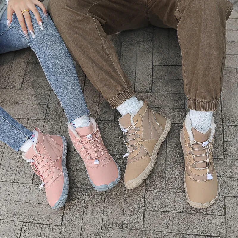 Outdoor snow boots in black, pink, or khaki with front lace-up, round toe, and low heel.