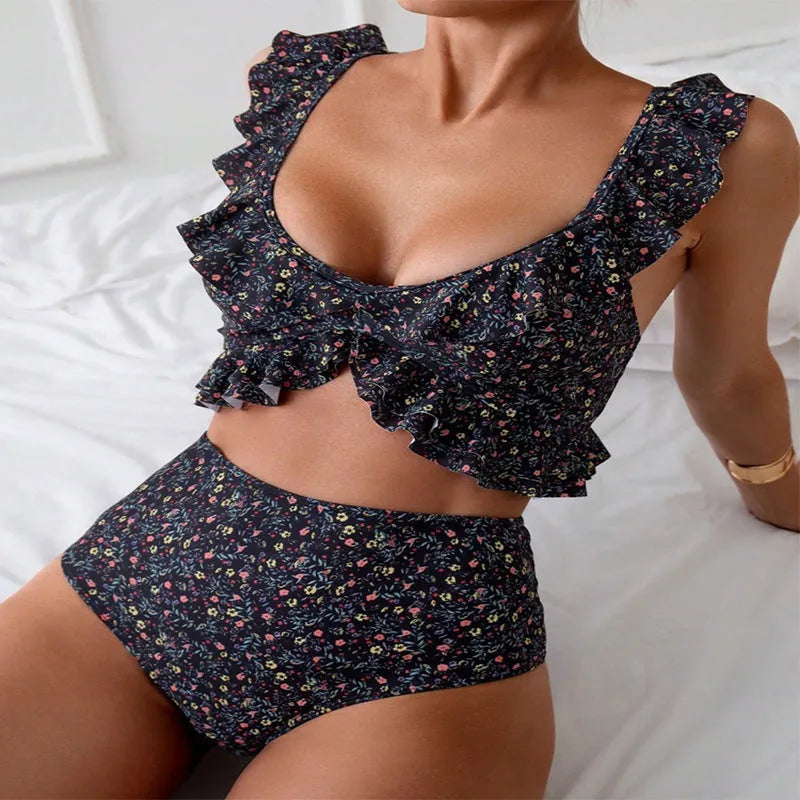 Women's floral flounce split backless swimsuit set in polyester on black background