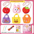Children's non-woven sewing kit with music theme, cloth pieces, and tools in a colour box measuring 19.5x16x5cm
