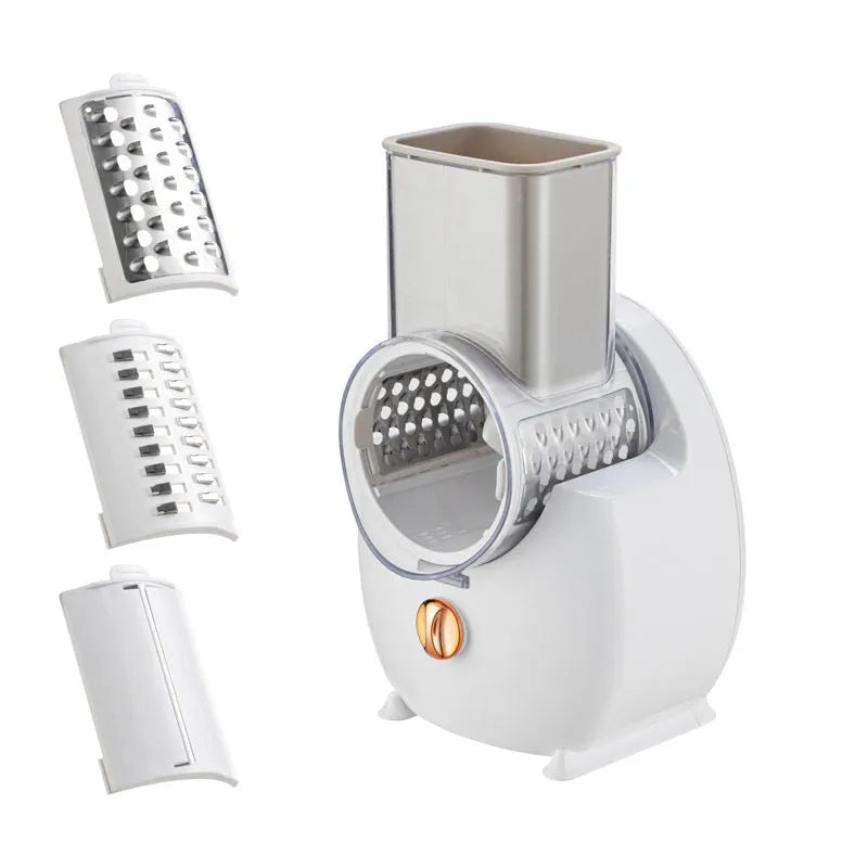 White electric vegetable slicer with suction base and multiple blades for kitchen food preparation