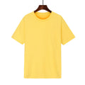 Men's black cotton T-shirt with short sleeves and loose fit design on mannequin