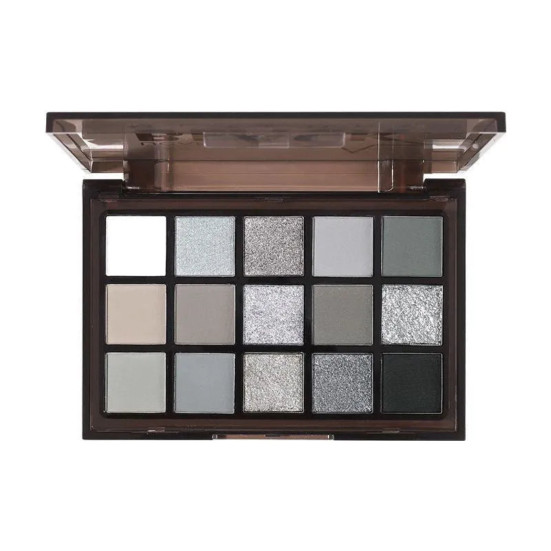 15-colour eyeshadow palette showing matte and shimmer pans including grey-black smokey shades