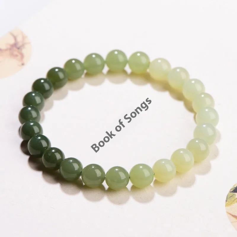 Natural clear water Hetian jade bracelet with gradient colour beads on wrist