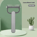 Green and grey dog de-matting combs in two sizes with stainless steel blades.