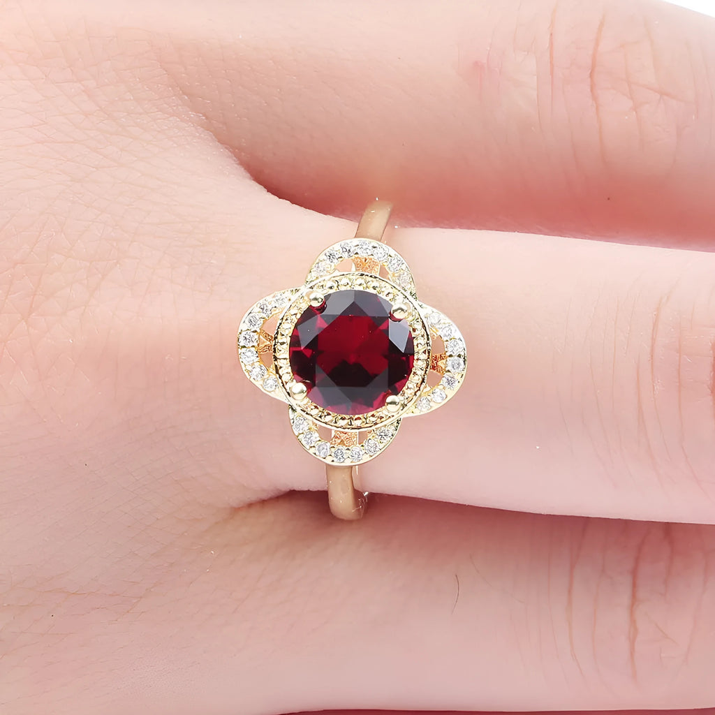 Copper zircon ring with a fruit-shaped design, shown in colour 10-6-1395.