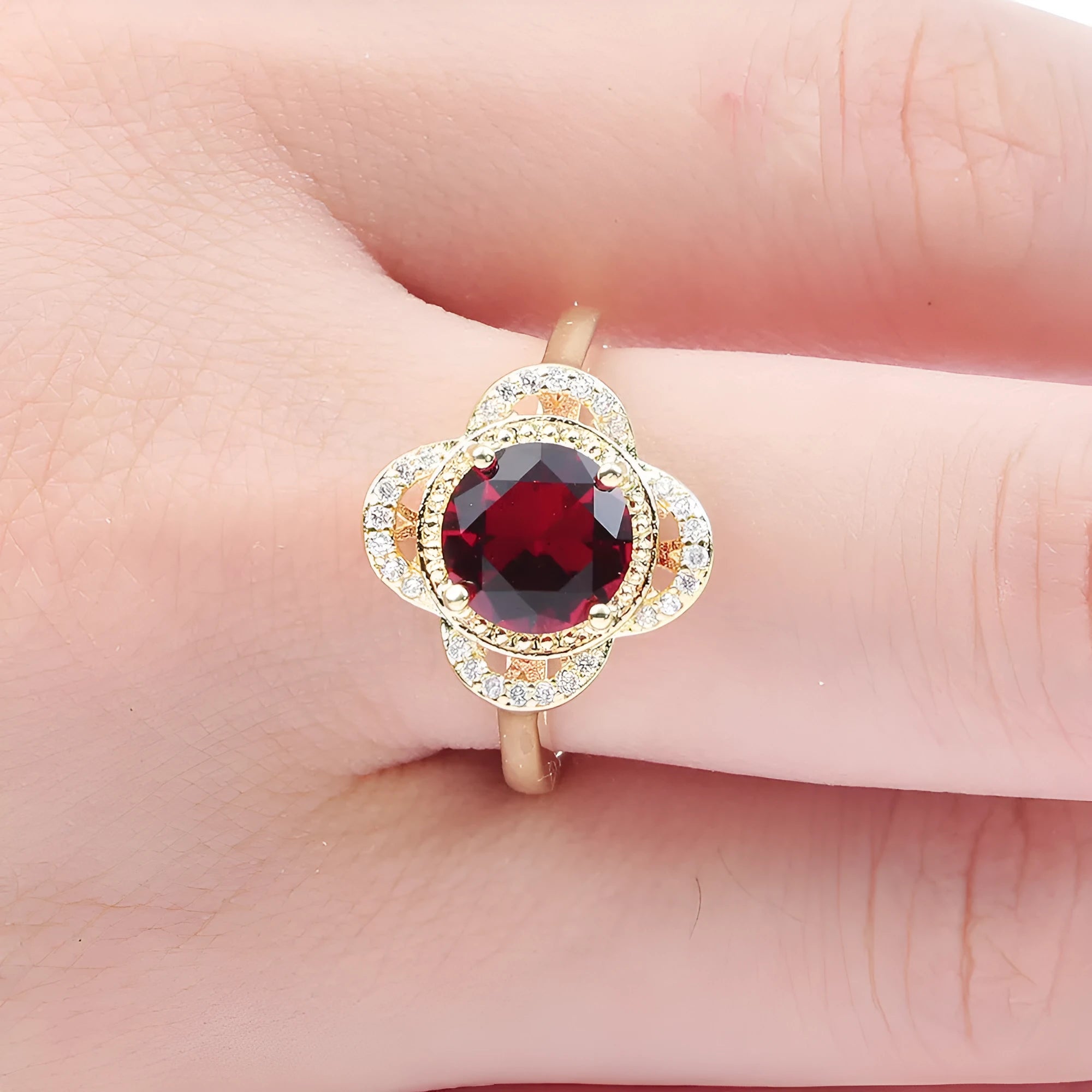 Copper zircon ring with a fruit-shaped design, shown in colour 10-6-1395.