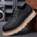 Men's black retro Martin boots with round toe design and non-slip rubber sole