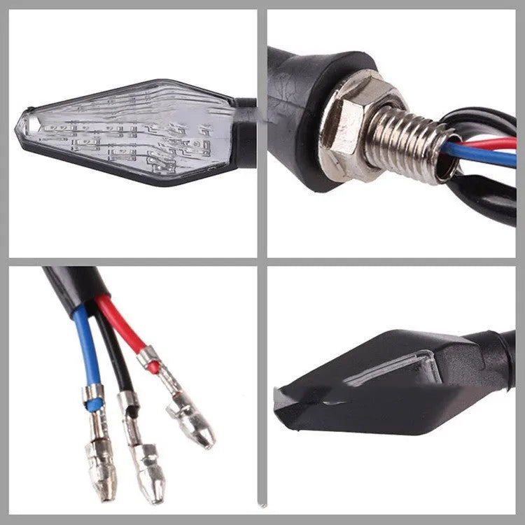 Motorcycle LED turn signal lights showing yellow and blue double-sided luminous indicators