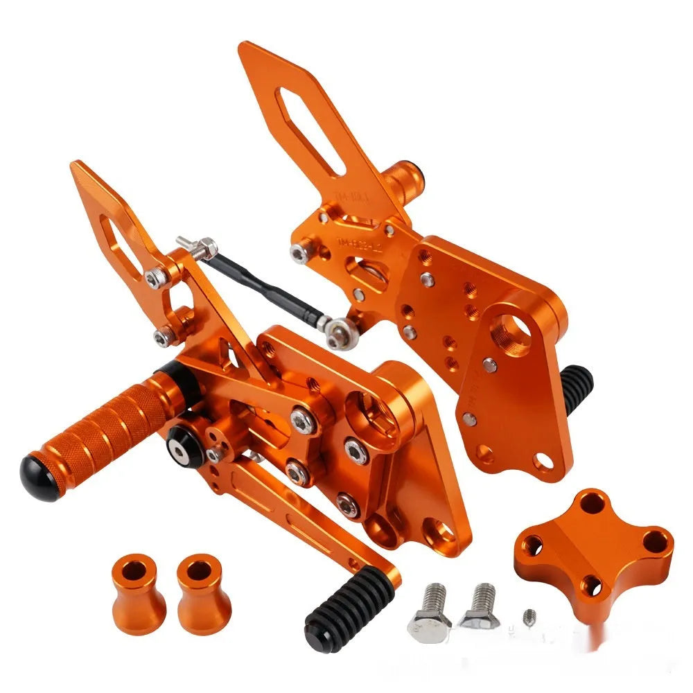 KTM DUKE motorcycle rear shift pedal support assembly modification kit in black and orange