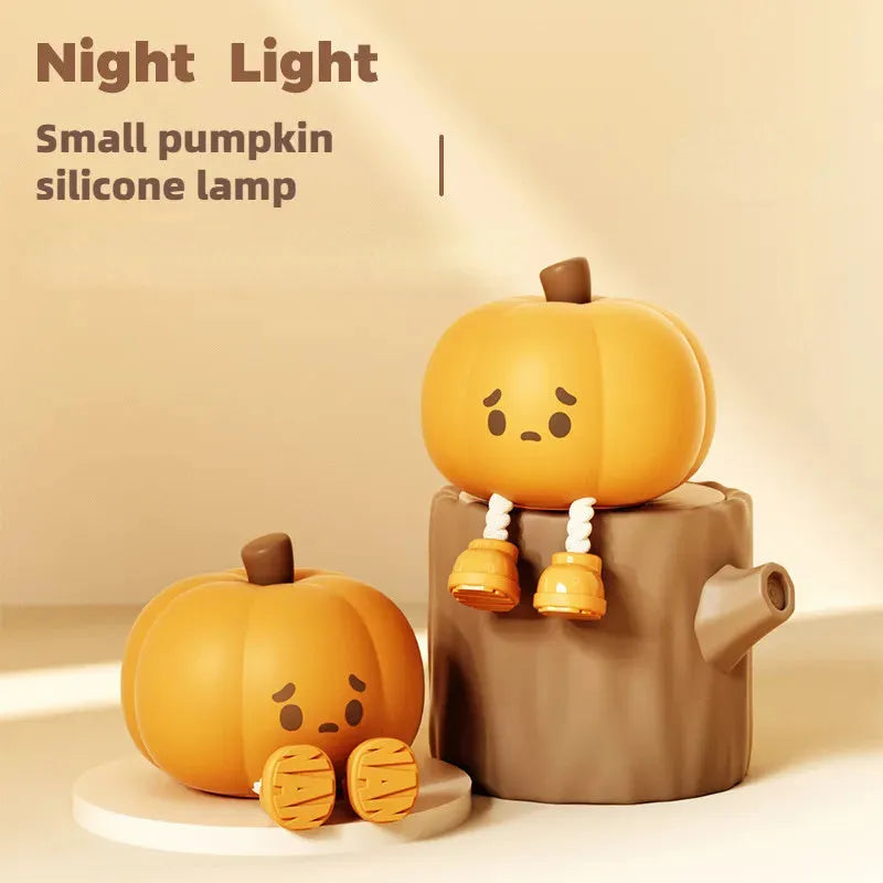 Orange pumpkin silicone night light with soft glowing illumination and touch controls
