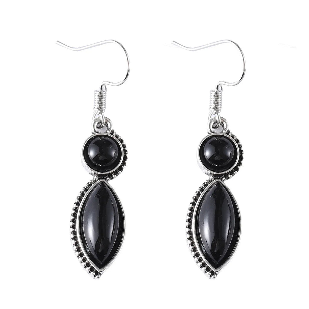 A pair of vintage geometric pendant earrings in black and purple with a round detail, made from zinc alloy.