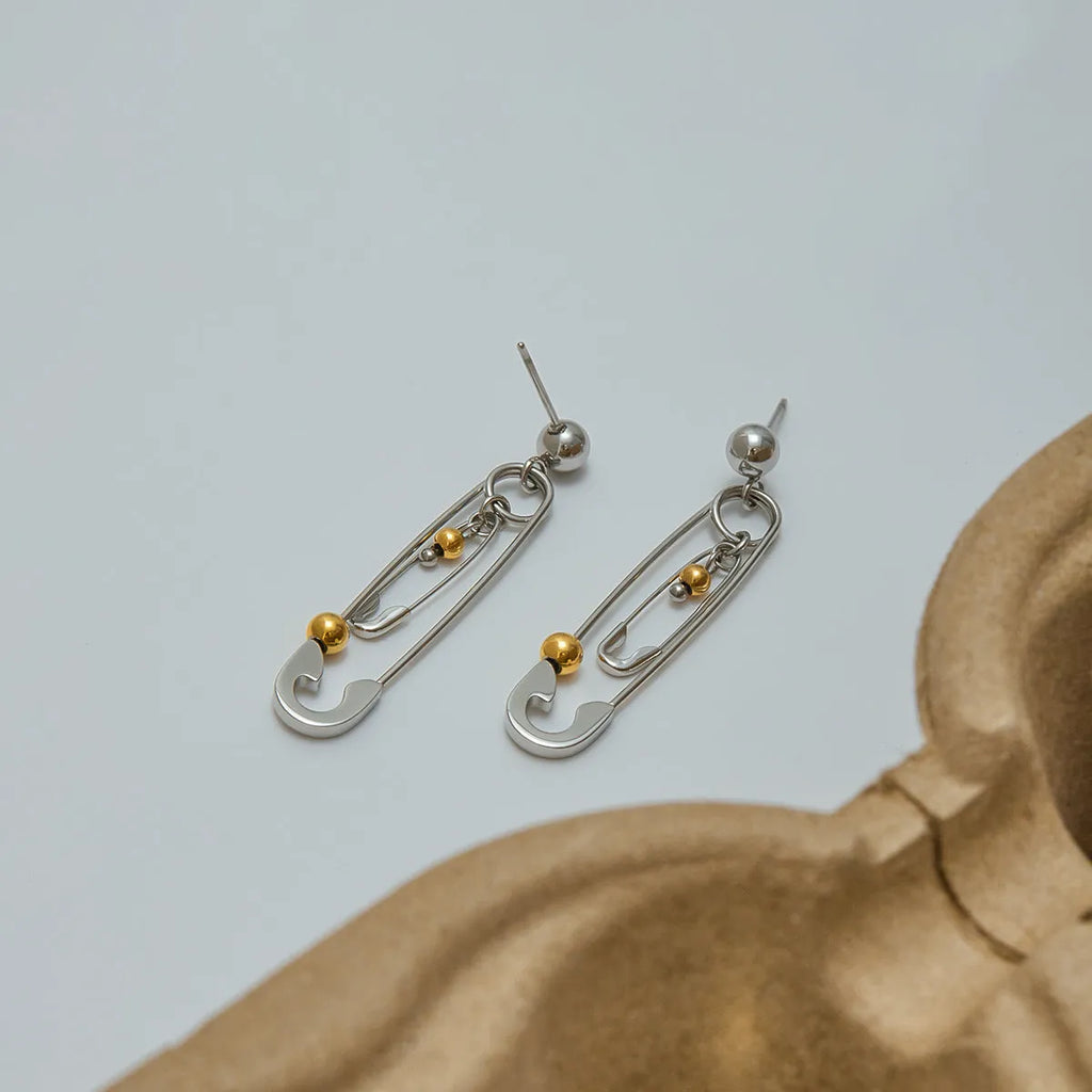 Stainless steel clip ear studs with geometric shape and electroplated finish for women