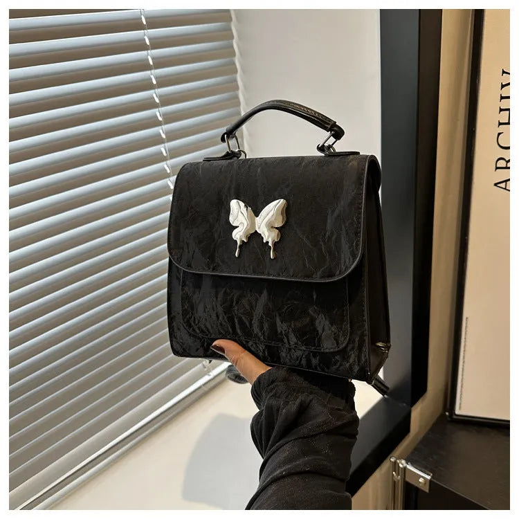 Preppy style women's backpack handbag in PU leather with bow detailing and six colour options
