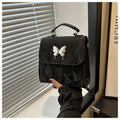 Preppy style women's backpack handbag in PU leather with bow detailing and six colour options