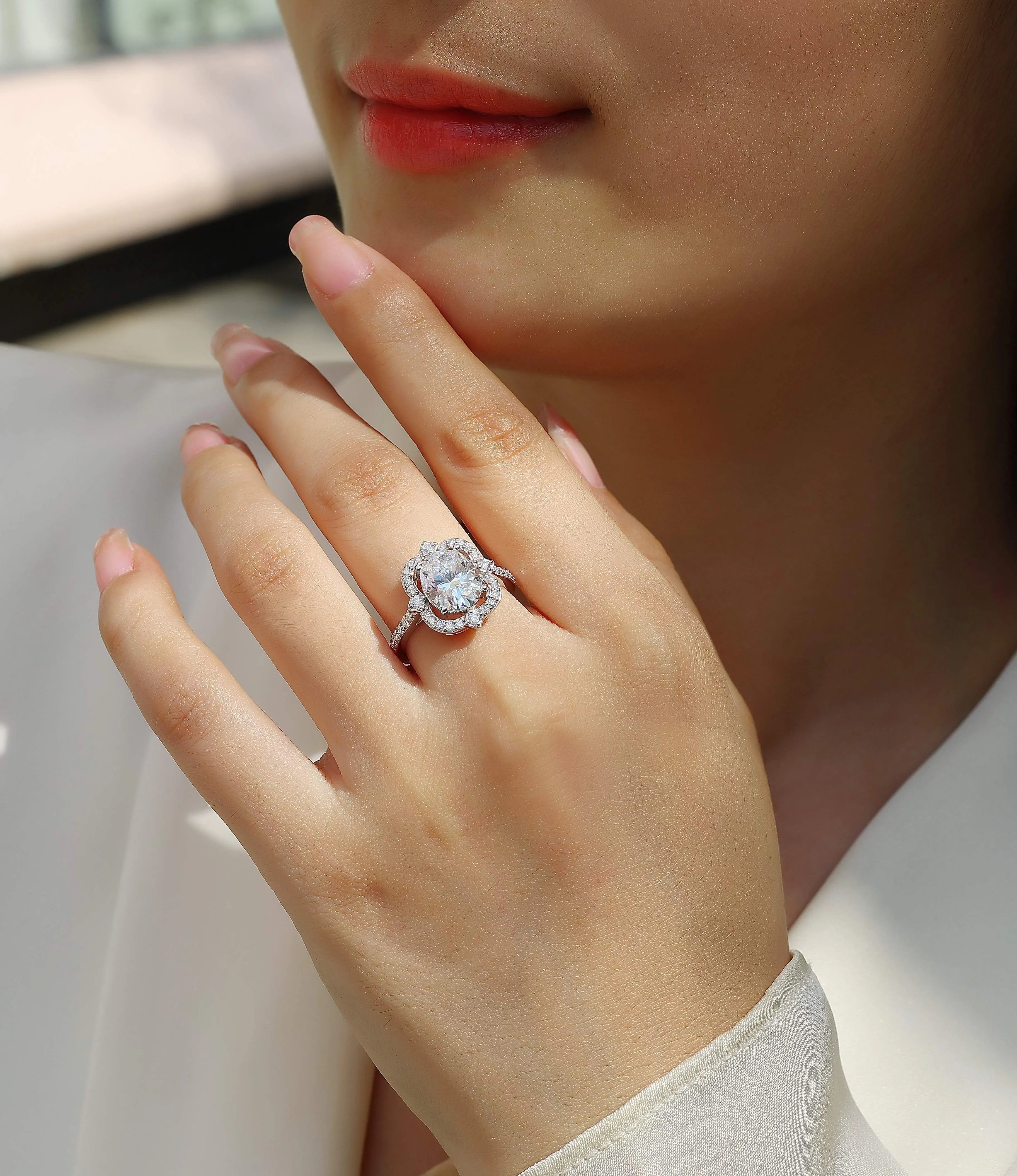 Camellia moissanite wedding ring set with egg-shaped 8x10mm stone, platinum-plated S925 silver band, gift box packaging