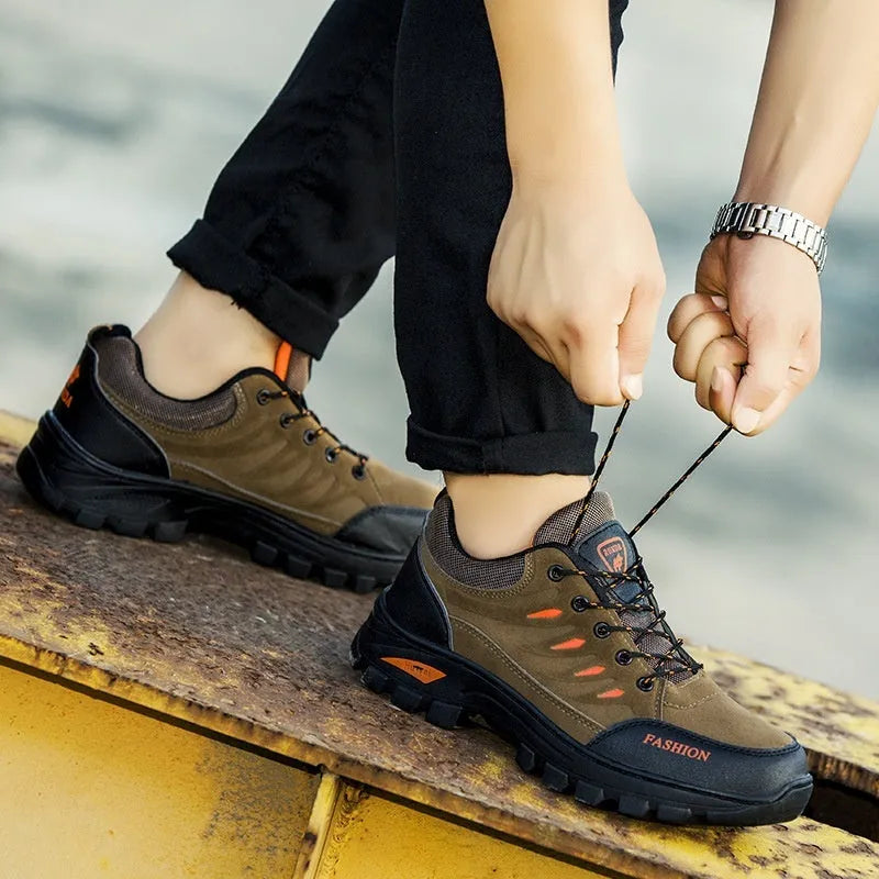 Men's mid-top hiking shoes with suede upper, round toe, and lace-up closure in multiple colour options