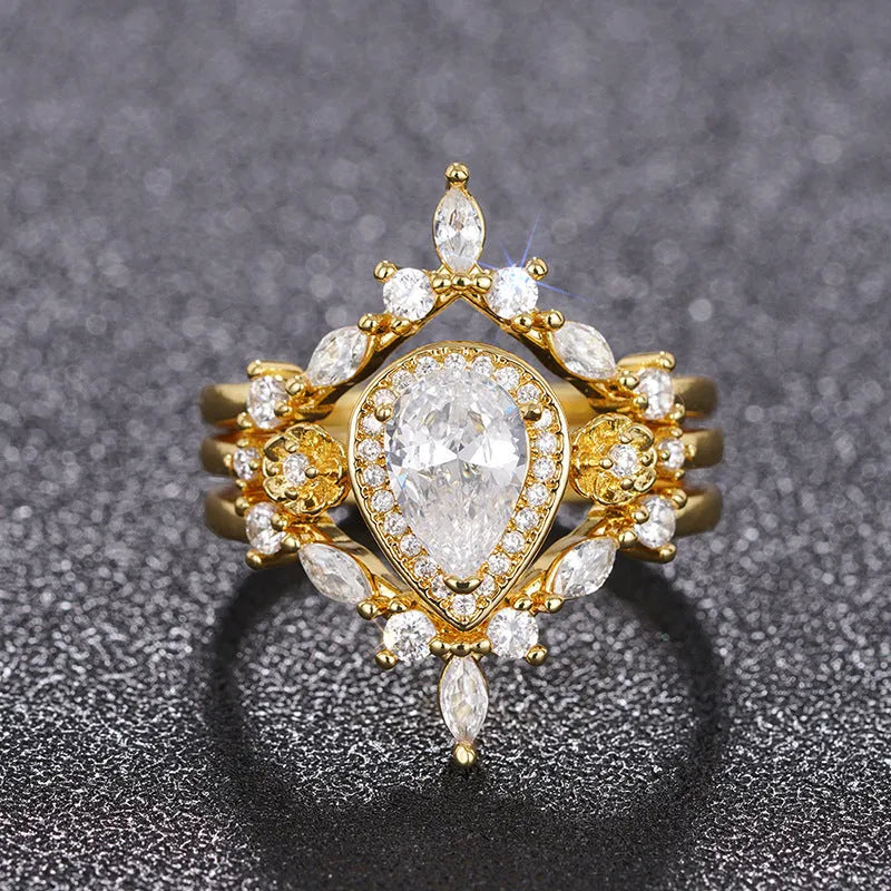 Women's light luxury drop-shaped zircon ring in T0541 yellow gold finish, copper base, geometric water droplet design