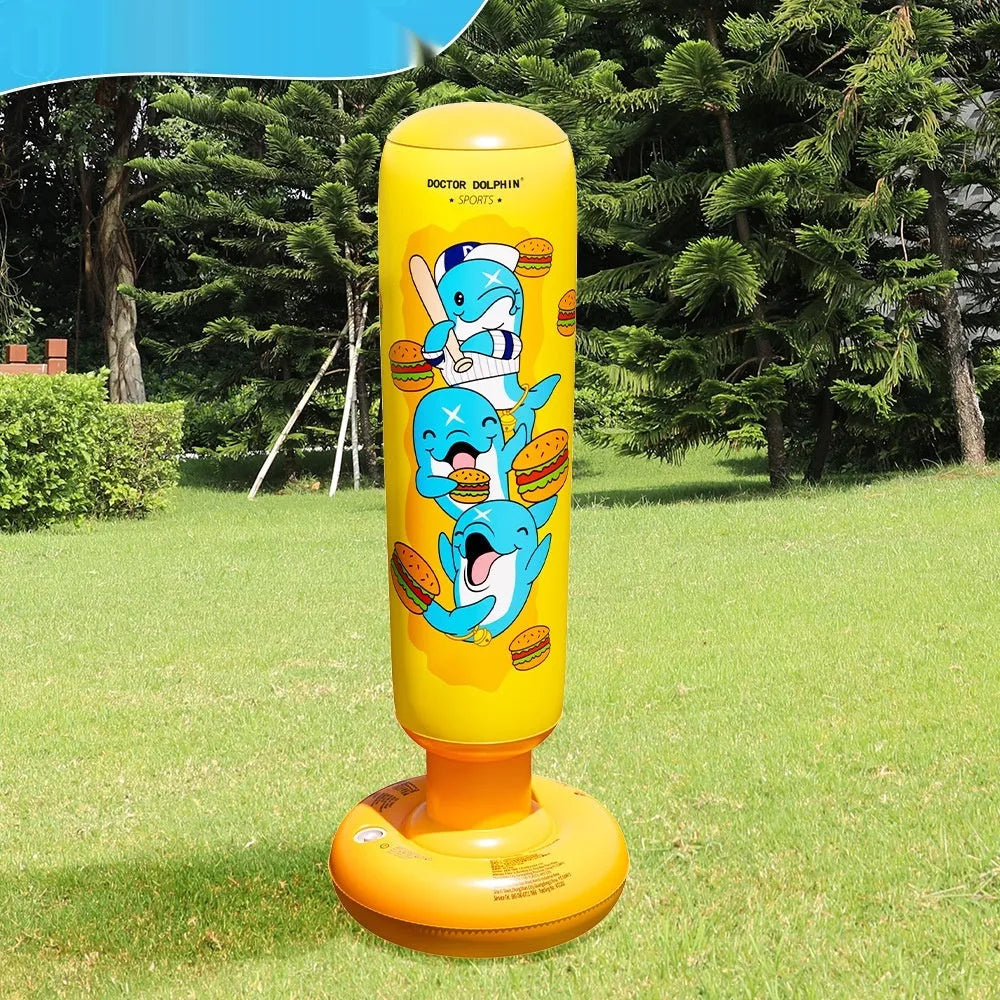 Tall yellow inflatable boxing column standing upright on a floor.