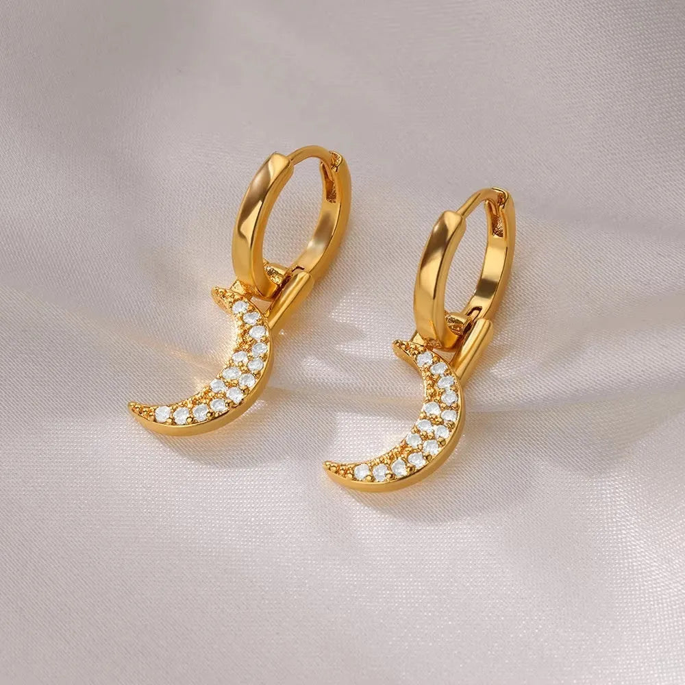 Women's geometric butterfly earrings in copper with heart and star details