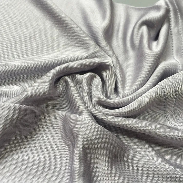 Men's loose fit silk shorts in navy blue, skin colour, and silver grey options with mid-waist design