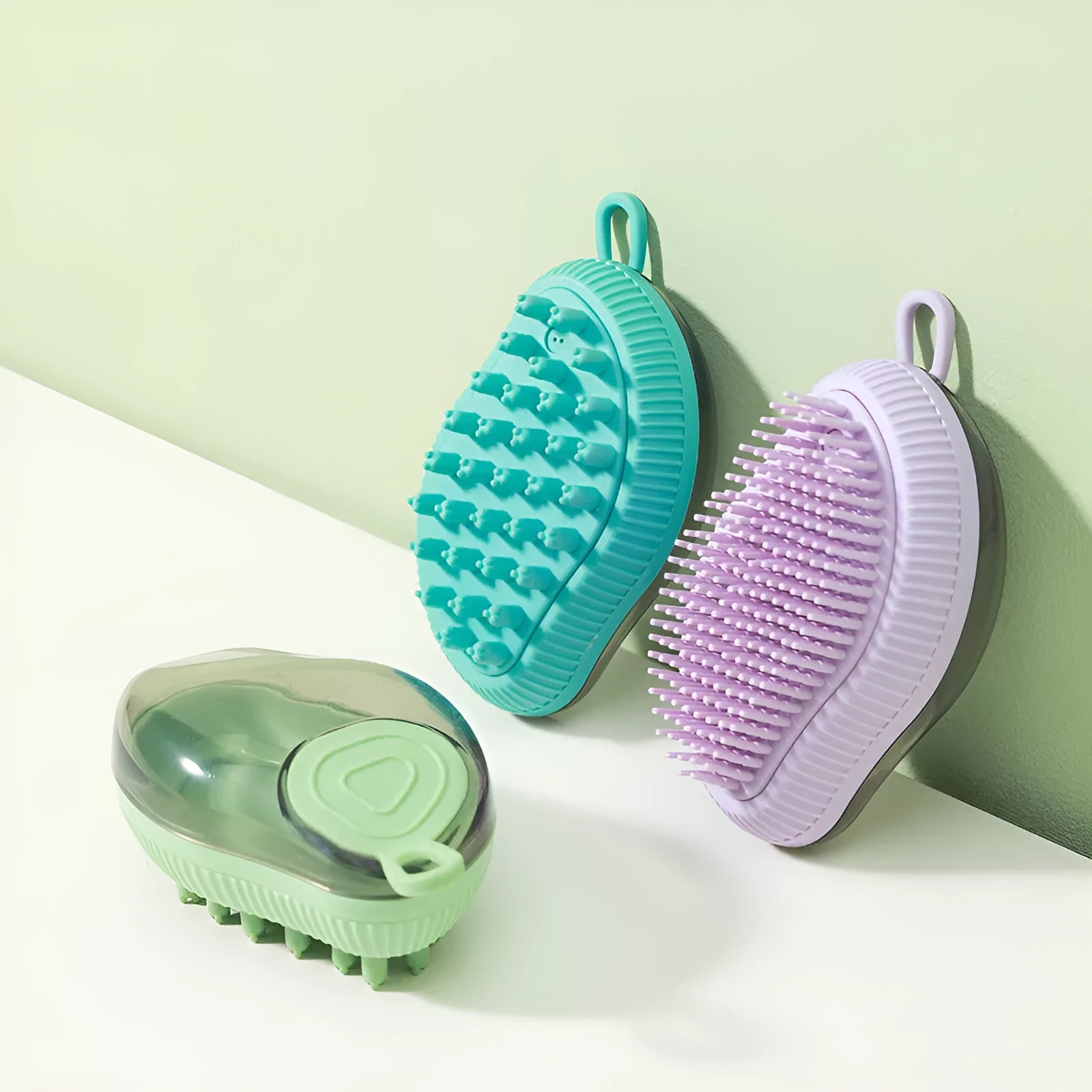 Styling pet silicone shower brush in dark green on a white background