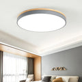 Round solid wood LED ceiling lamp with Nordic design in white finish showing dimmable light feature