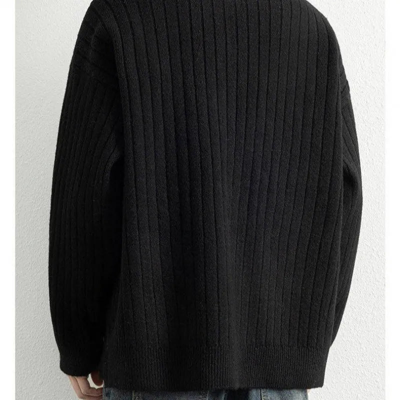 Men's grey half zip loose fit pullover sweater with textured knit on a hanger.