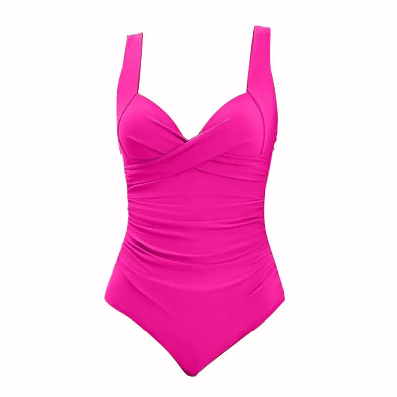 Solid colour push-up one-piece swimsuit on a hanger, showing sleeveless design and form-fitting polyester fabric.