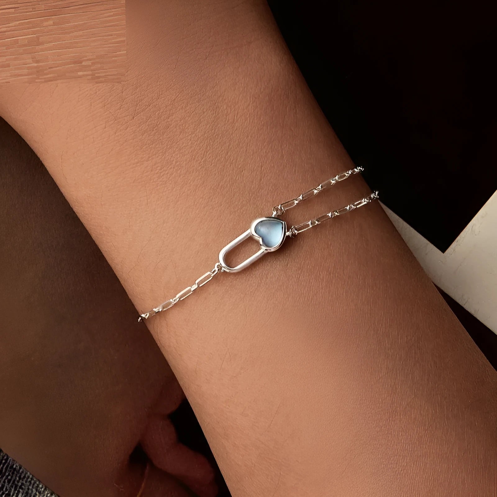 S925 sterling silver heart lock bracelet for women with electroplated finish on white background