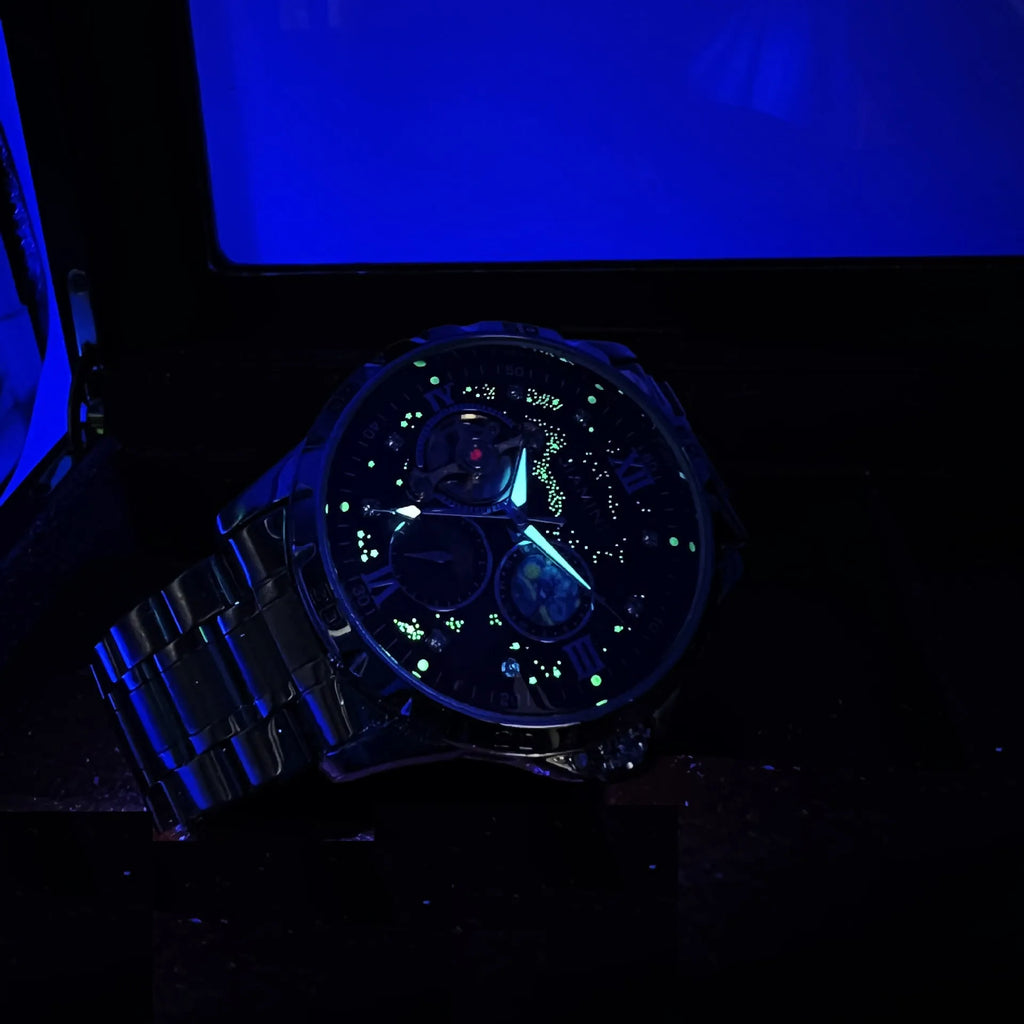Automatic mechanical men's watch with rose gold shell, black dial, and large multifunctional display.
