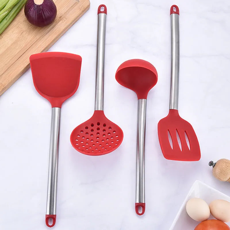 8-piece silicone kitchenware set with stainless steel tube handles in black and red