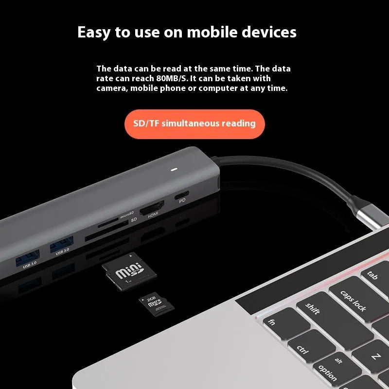 LQT-LH07 7-in-1 USB-C PD computer hub and card reader on a desk.